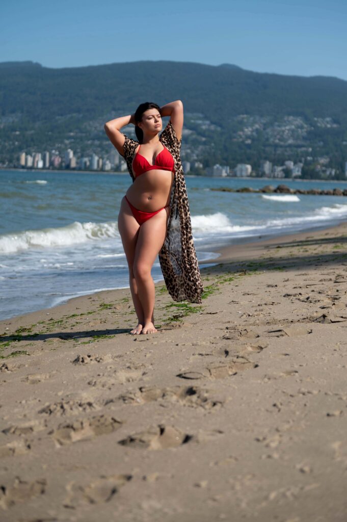 Young Woman in Red Bathing Suit posing for Outdoor Boudoir Photography in Vancouver BC